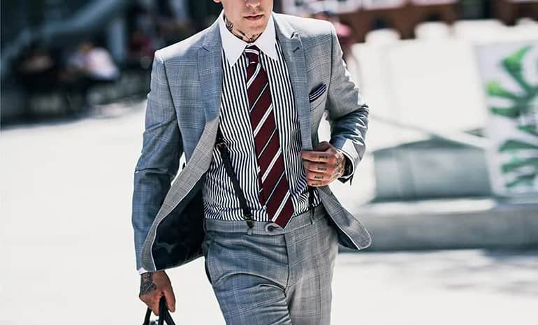 Jakie krawaty najlepiej pasują do koszuli w paski? Oto porady